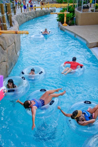 Family on Lazy River Palm Beach Moody Gardens copy